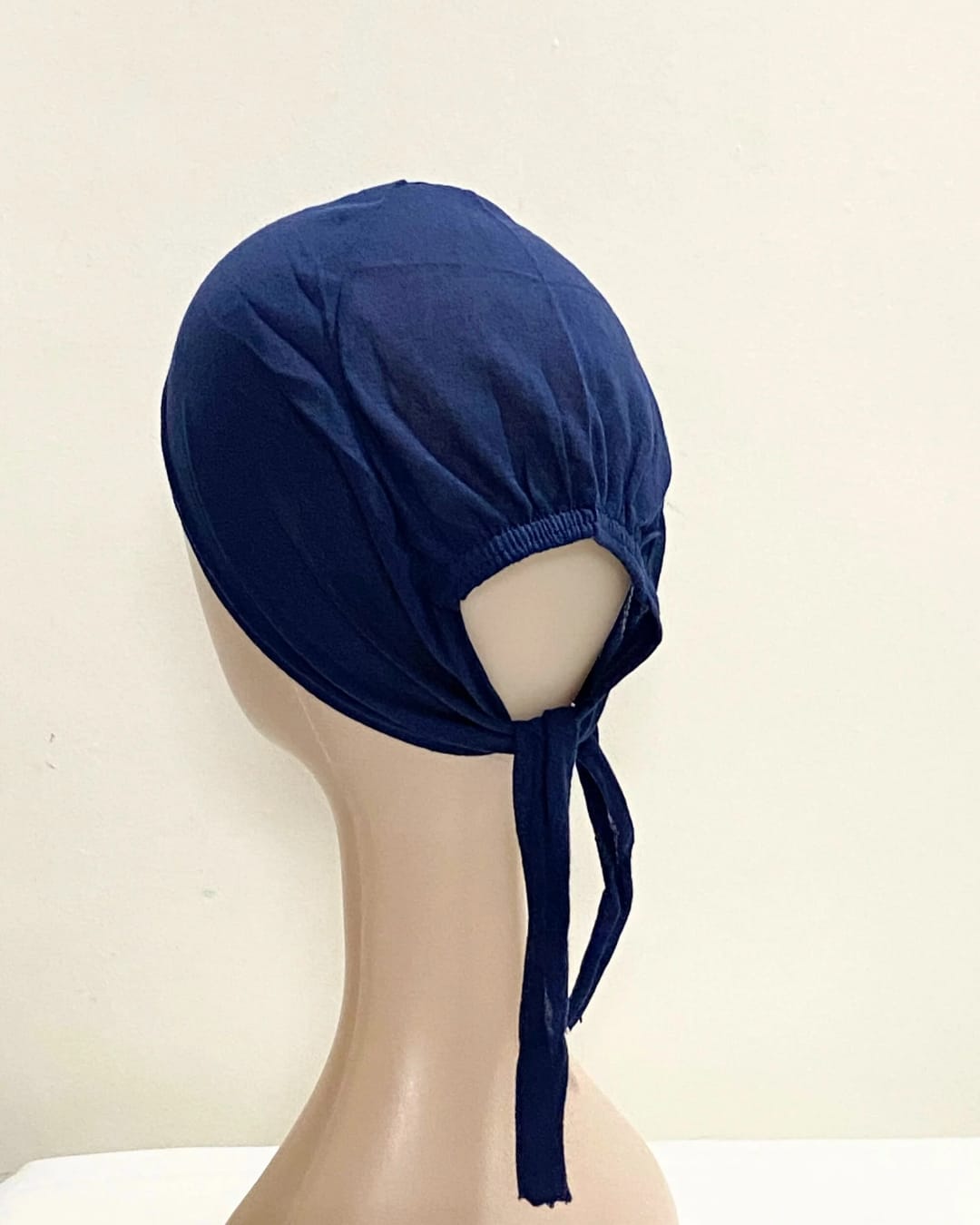 tie back cap