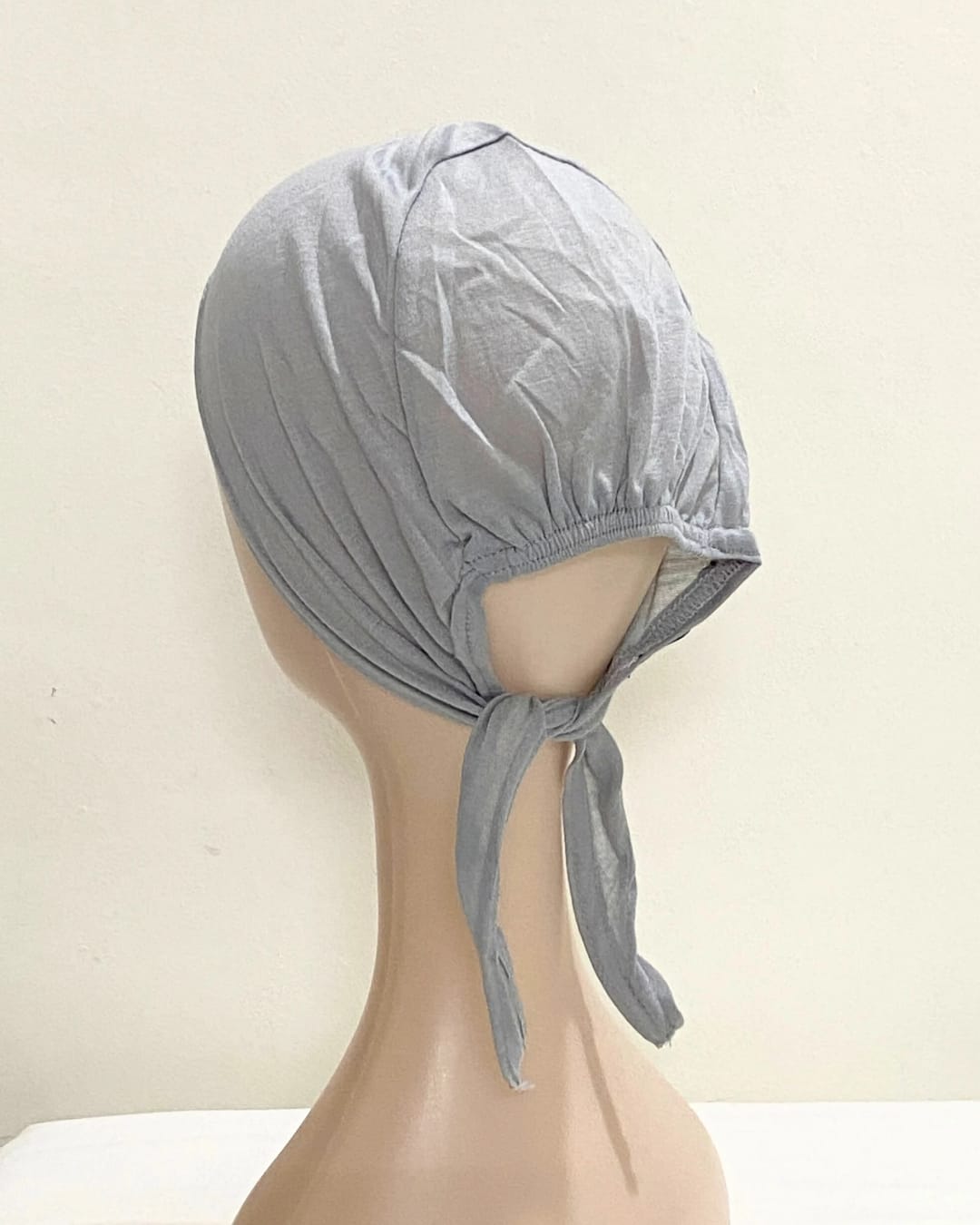 tie back cap